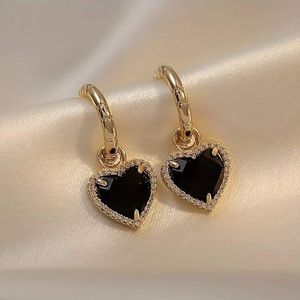 Gold plated black heart earrings